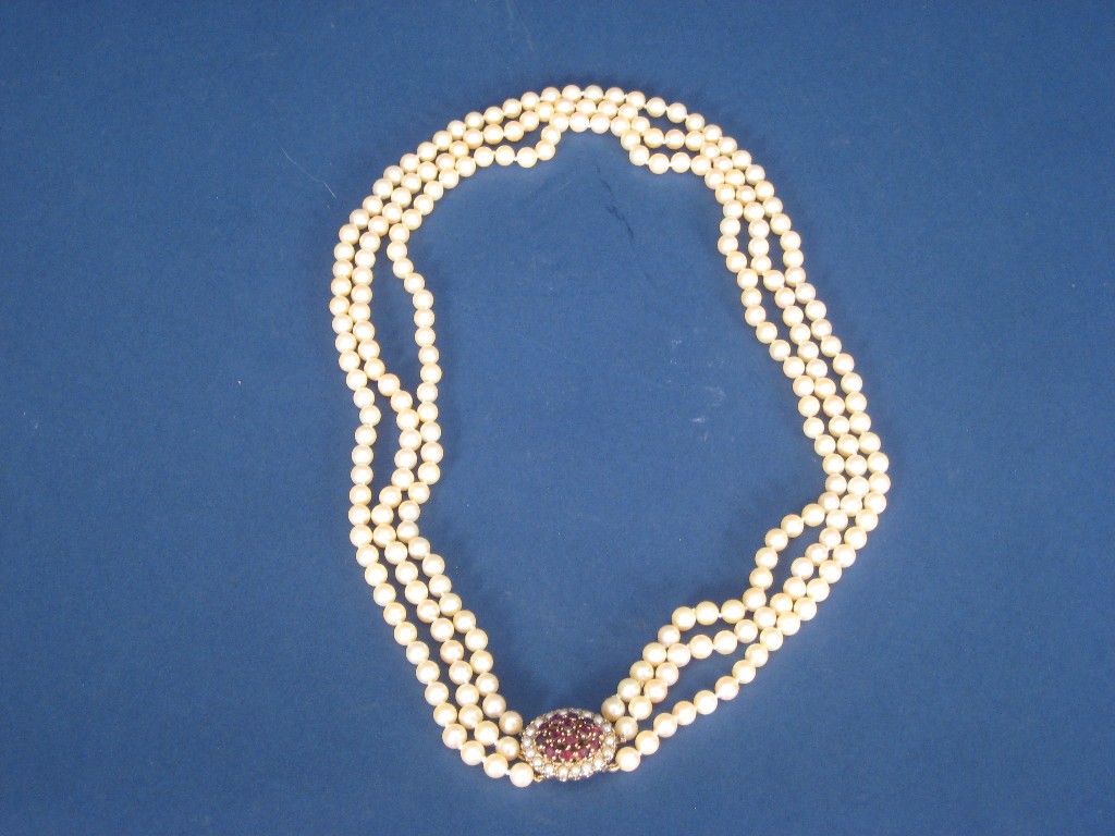 Appraisal: A triple row Pearl Necklace the ct gold clasp set