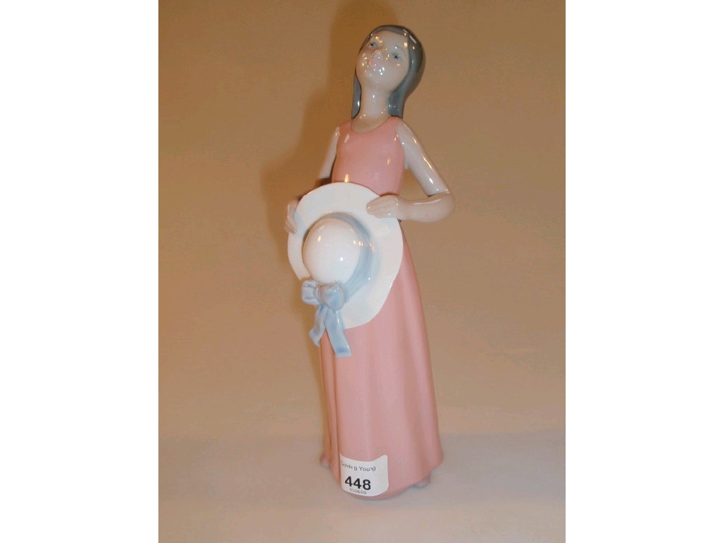 Appraisal: A Lladro figure of a young girl wearing a pink