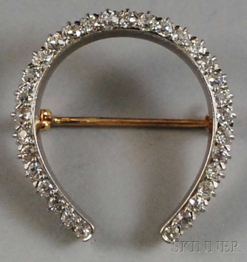 Appraisal: kt Gold Platinum and Diamond Horseshoe Brooch the diamonds mounted