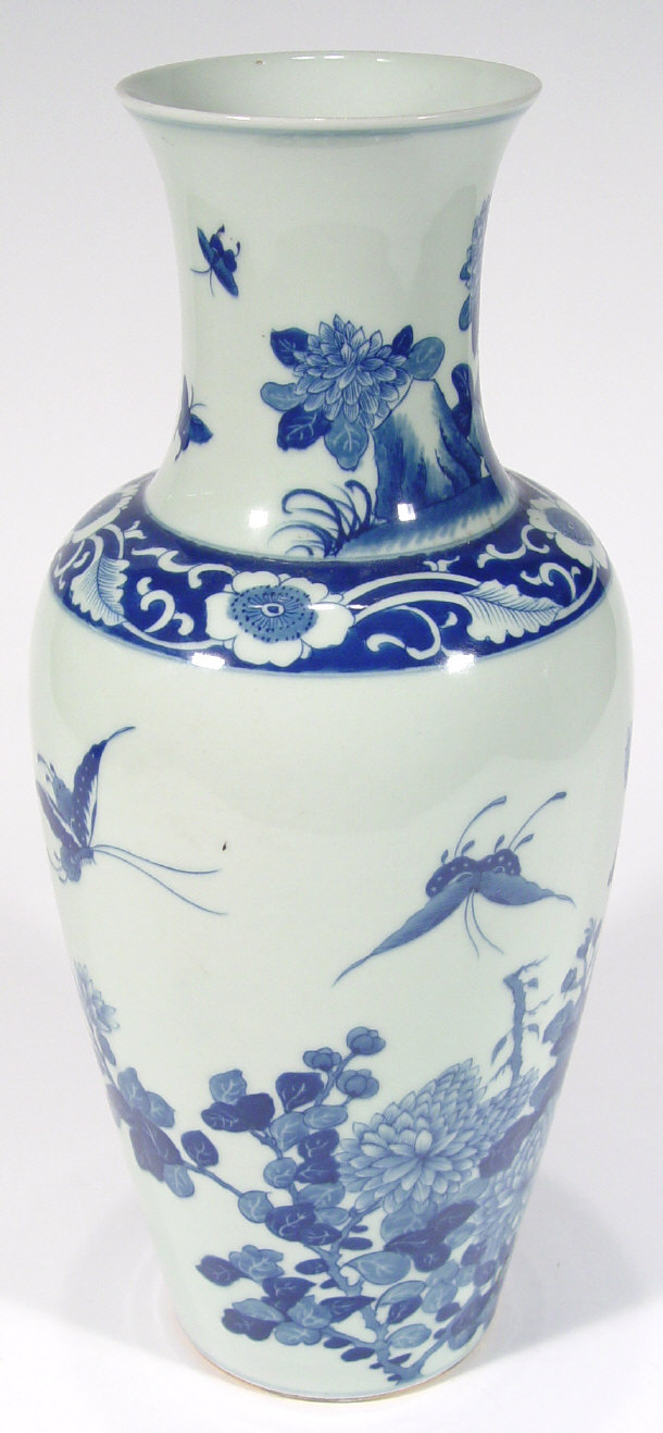 Appraisal: Oriental porcelain vase painted with blue flowers and butterflies cm