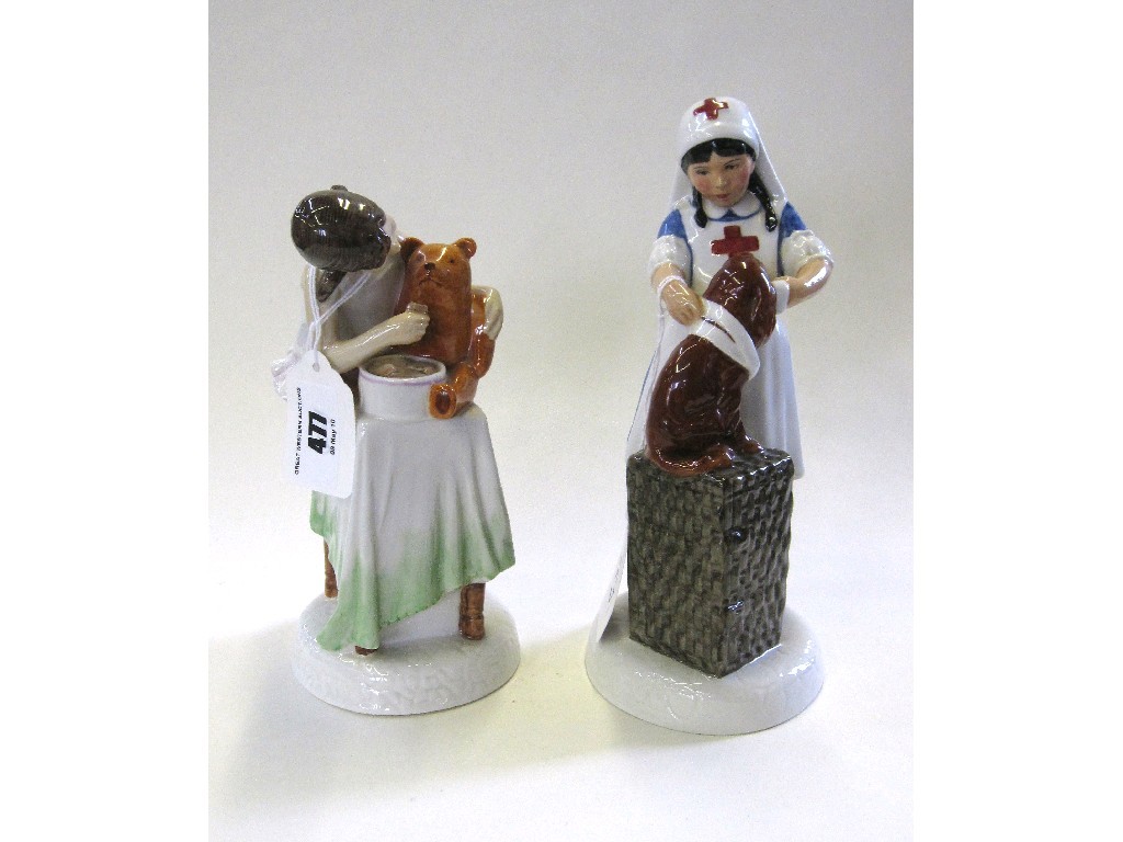 Appraisal: Two Royal Doulton figures from the Childhood Days series -