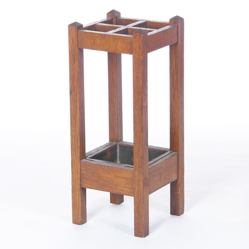 Appraisal: ARTS CRAFTS Umbrella stand with four compartments shaped top posts