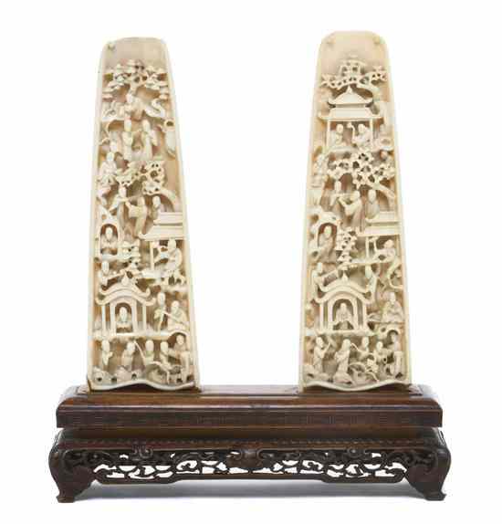 Appraisal: A Well-Carved Pair of Chinese Ivory Wrist Rests of tapering