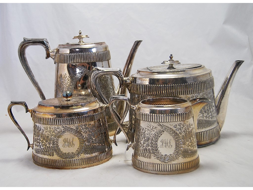 Appraisal: Four piece Britannia metal tea service engraved overall a f