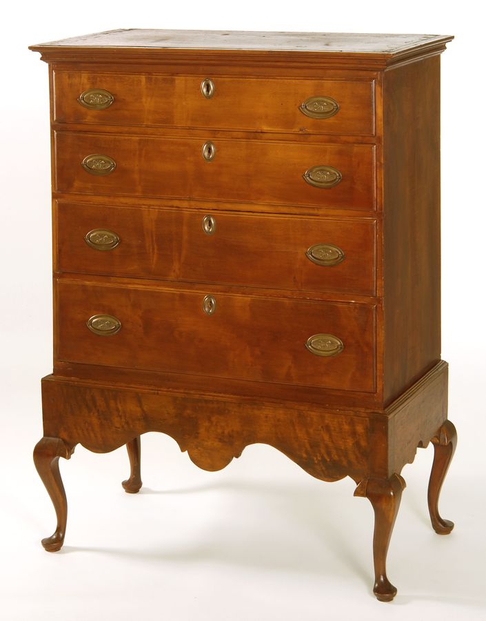 Appraisal: ANTIQUE AMERICAN FOUR-DRAWER BUREAU In cherry with curly maple or