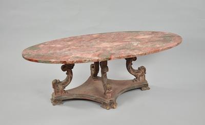 Appraisal: A Low Marble Top Table With an ovoid mutton fat