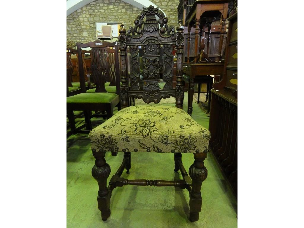 Appraisal: A set of four Victorian carved oak dining chairs with