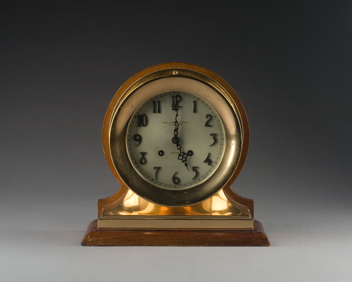 Appraisal: AMERICAN BRASS SHIP'S BELL CLOCK RETAILED BY BAILEY BANKS AND