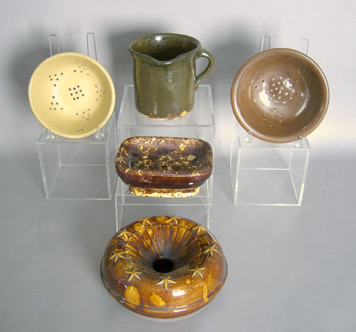 Appraisal: Two stoneware colanders together with a Rockingham soap dish spittoon