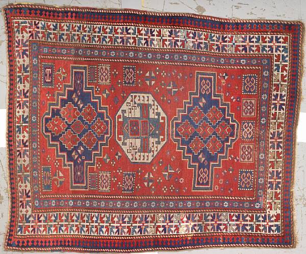 Appraisal: A Kazak rug size approximately ft in x ft ft