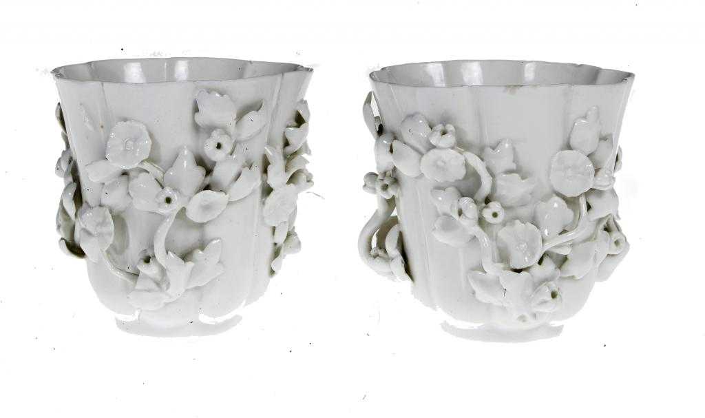 Appraisal: A PAIR OF CONTINENTAL 'BLANC DE CHINE' BEAKERS of lobed