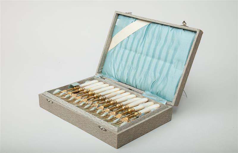 Appraisal: Set of Twelve Mother-of-Pearl Handled Gilt-Metal Dessert Forks and Knives