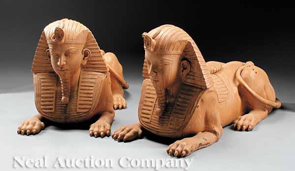 Appraisal: A Pair of Continental Terracotta-Painted Bronze Sphinxes figures depicted with