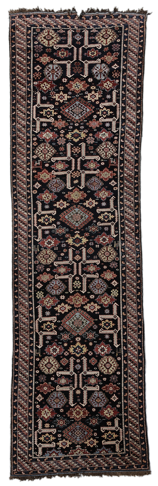 Appraisal: Caucasian Runner early th century repeating floral and geometric devices