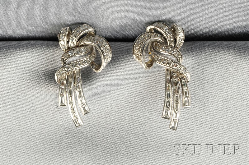 Appraisal: Platinum and Diamond Earclips each designed as a ribbon set