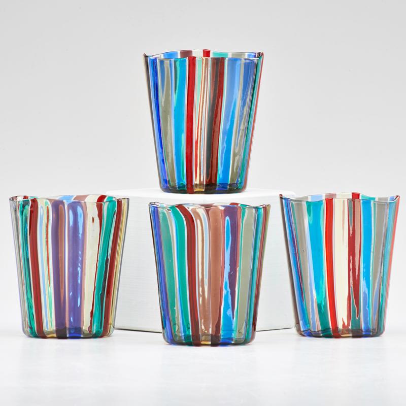 Appraisal: GIO PONTI VENINI Set of four blown glass Canne tumblers