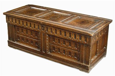 Appraisal: A th century oak chest with a triple panelled top