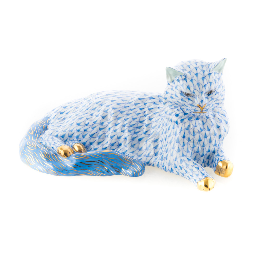 Appraisal: Herend porcelain recumbent cat blue fishnet pattern with gilt accents