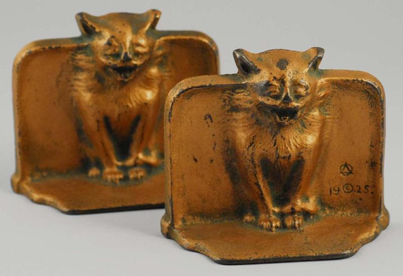 Appraisal: Cast Iron Cat Bookends Description Dated Condition Excellent Size T