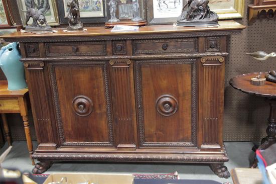 Appraisal: CREDENZA Walnut having a dentil carved frieze over five foliate