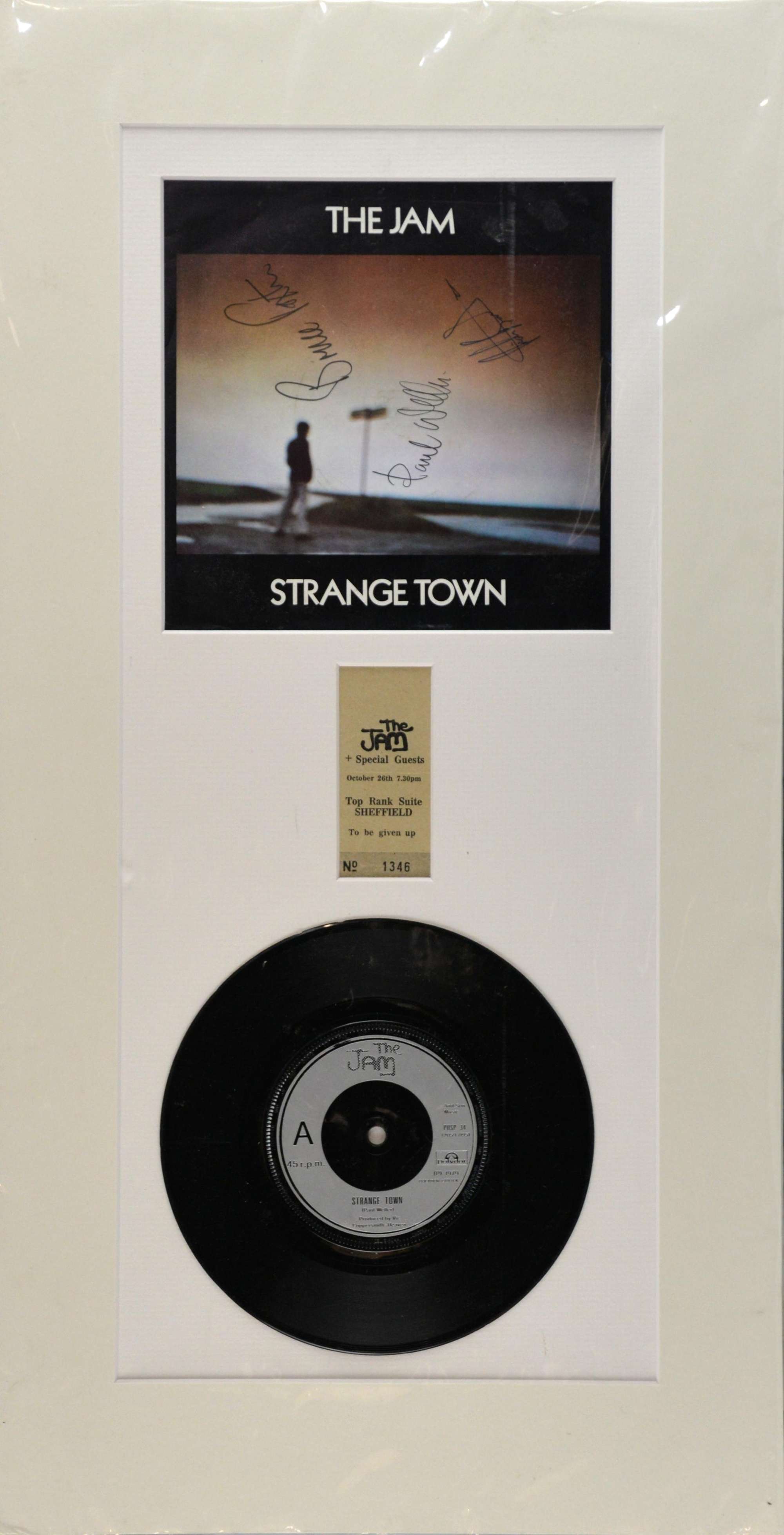 Appraisal: The Jam Strange Town picture-sleeve inch single fully signed by