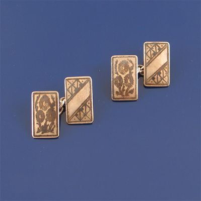 Appraisal: A pair of cufflinks by H G Murphy Rectangular silver