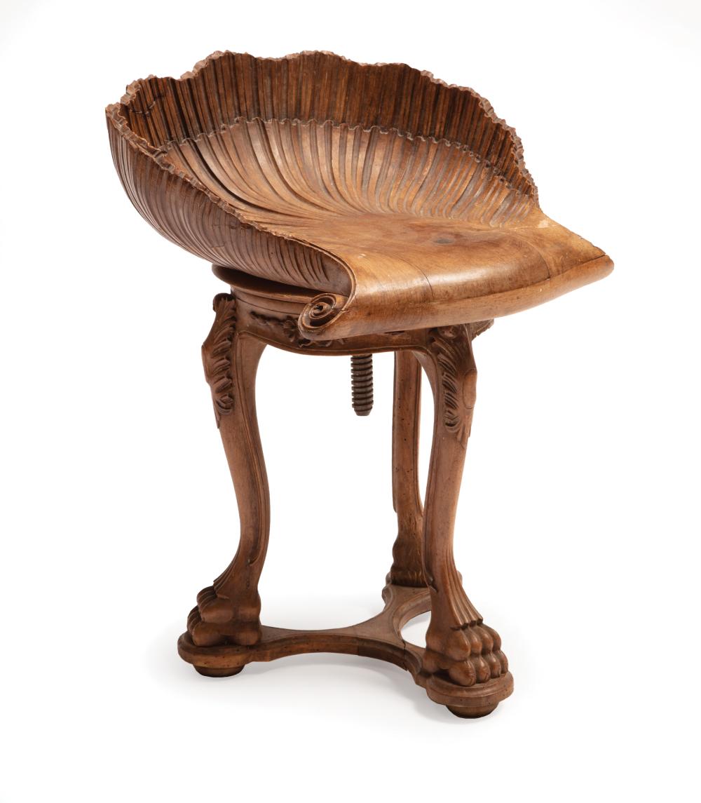 Appraisal: Italian Grotto-Style Carved Walnut Stool scrolled shell-form seat acanthine and