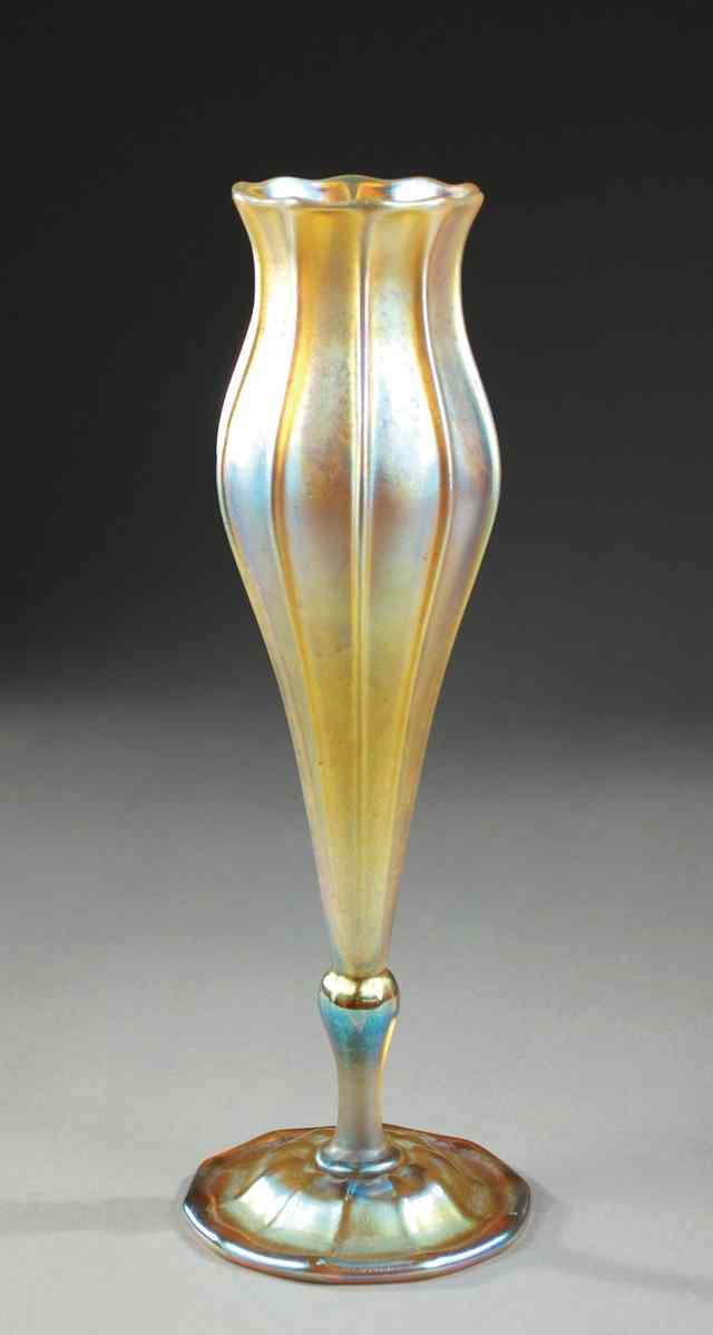 Appraisal: TIFFANY FAVRILE GOLD ART GLASS TRUMPET VASE with violet iridescence