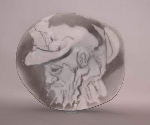 Appraisal: Man in Hat Wall Platter Platter with Abstract Fish Smokeless