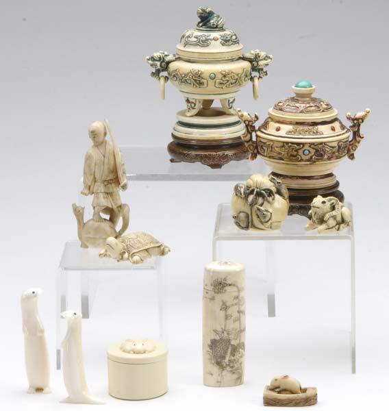 Appraisal: ASIAN IVORY Eleven pieces two carved ivory covered jars arachaic-style