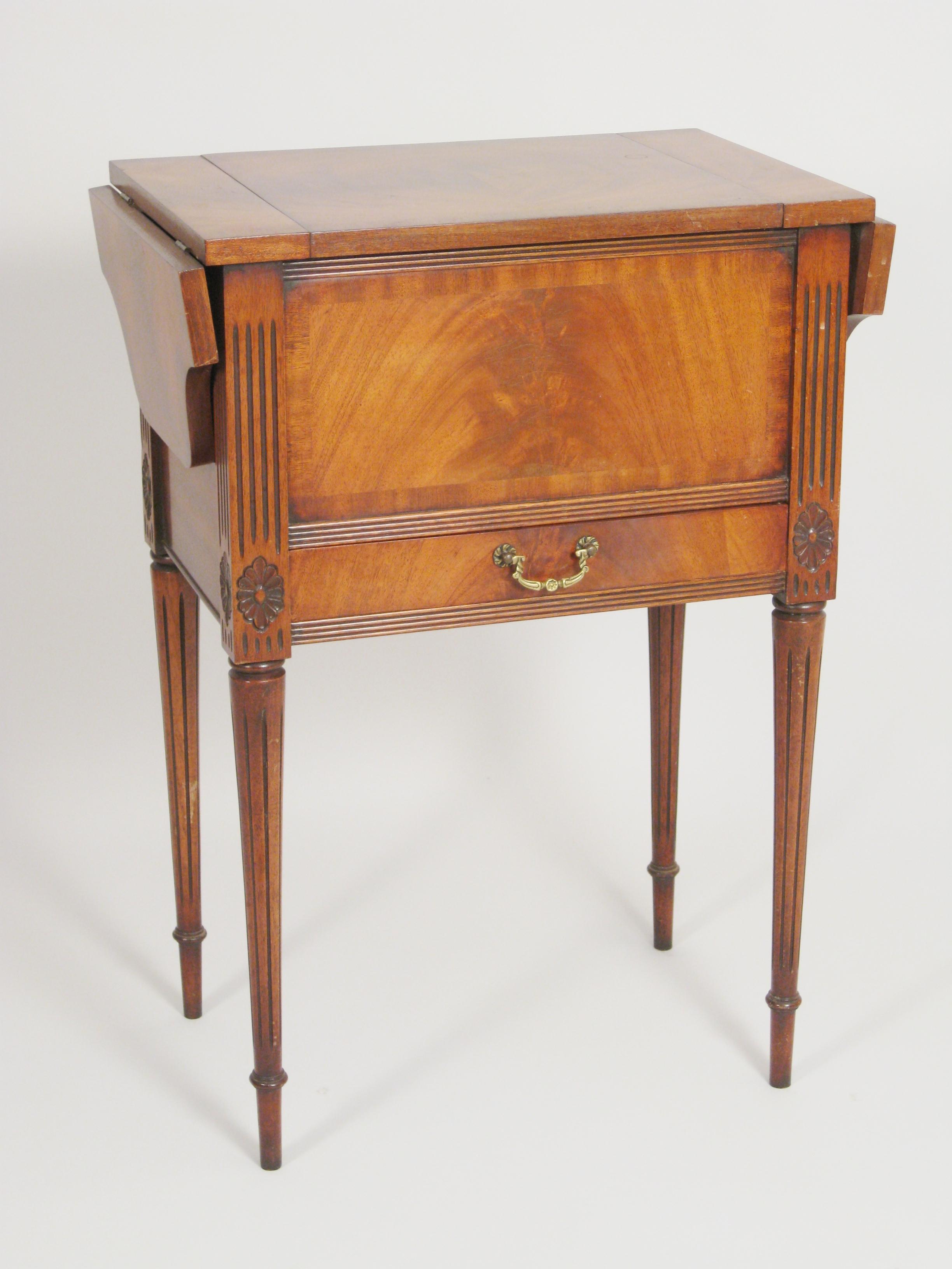 Appraisal: A Hepplewhite style mahogany Work Table with hinged top and