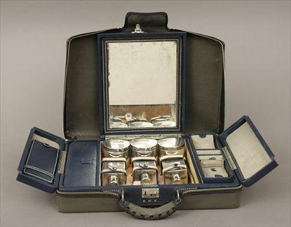 Appraisal: Traveling Dressing Set in Blue Leatherette Case With silverplate bottles