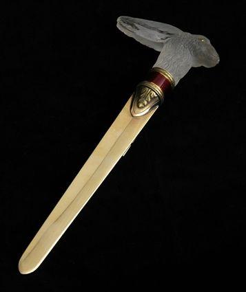 Appraisal: CONTINENTAL ENAMEL-MOUNTED GILT-METAL LETTER OPENER WITH RABBIT-CARVED ROCK CRYSTAL HANDLE