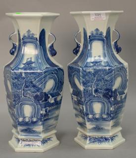 Appraisal: Pair of blue and white porcelain vases with landscape scenes