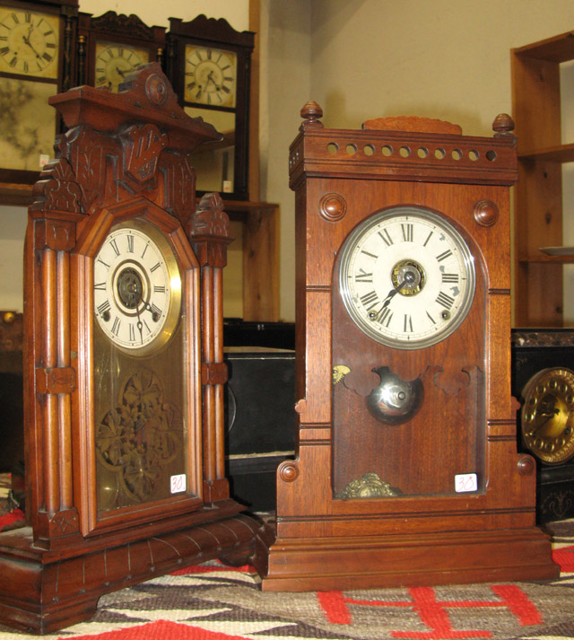 Appraisal: TWO AMERICAN VICTORIAN WALNUT-CASED KITCHEN CLOCKS by Seth Thomas and