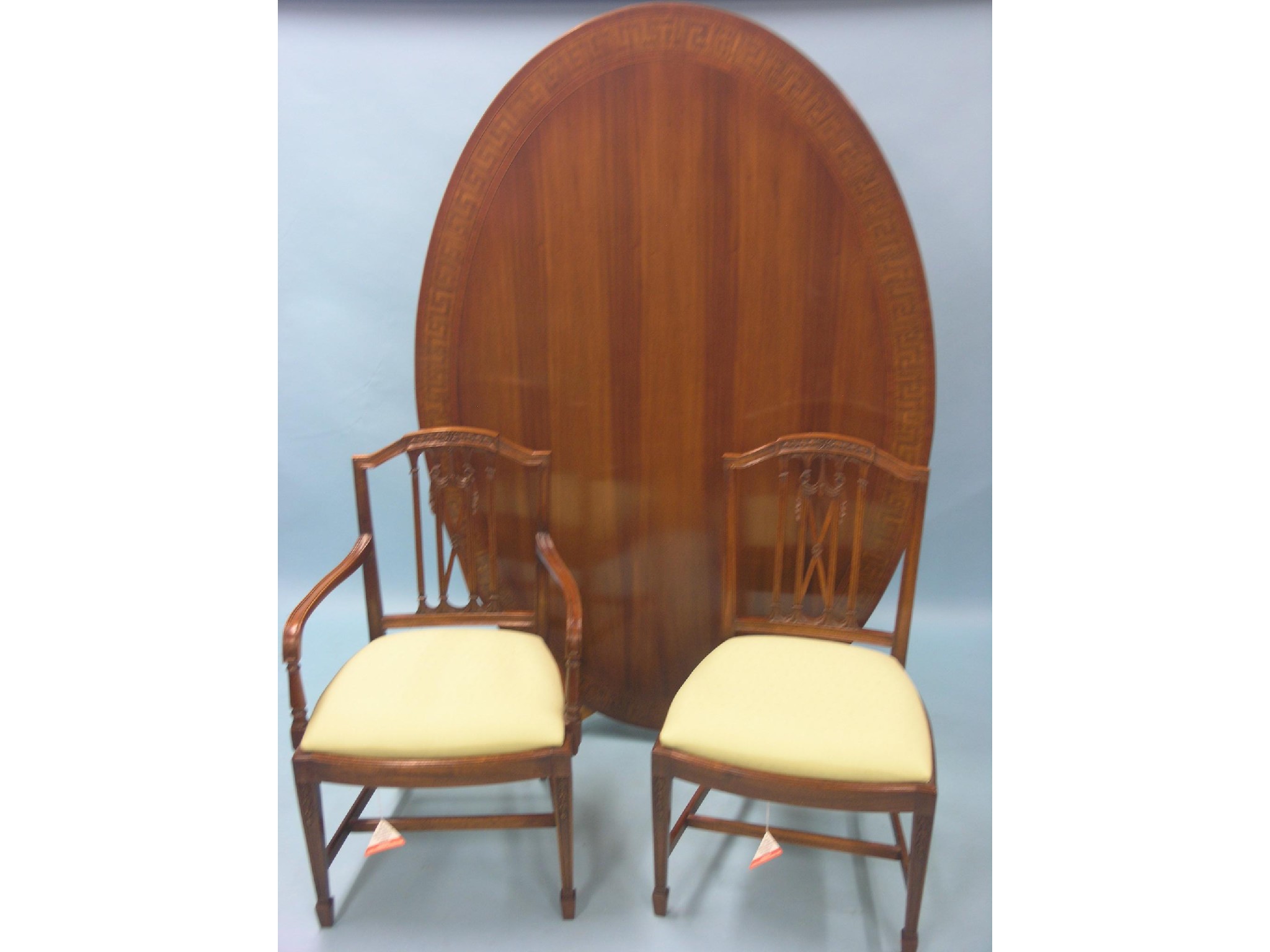 Appraisal: A good quality reproduction mahogany dining set large table with