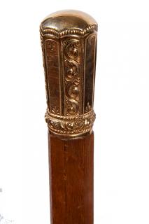 Appraisal: Gold Dress Cane- Ca - An ornate unmarked but tested