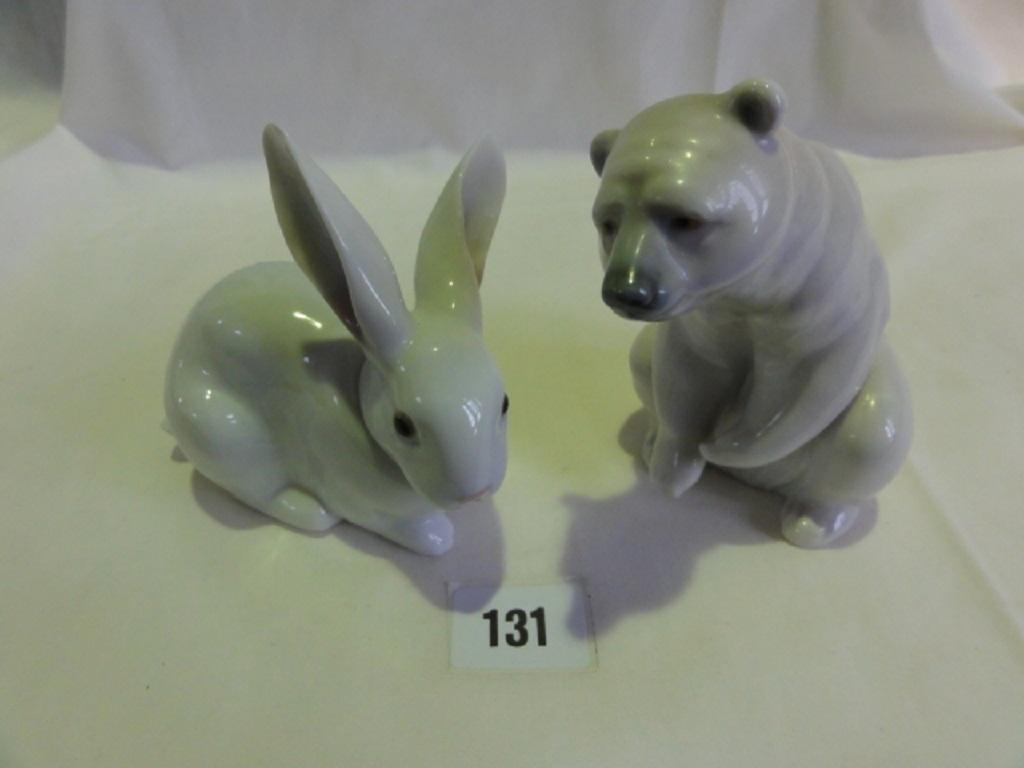 Appraisal: A Lladro model of a seated polar bear together with