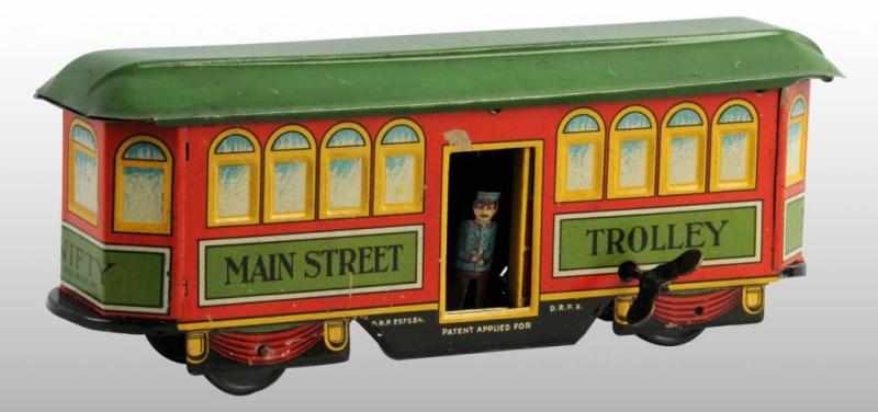 Appraisal: Tin Main Street Trolley Wind-Up Toy Description German Working Marked