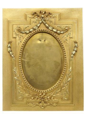 Appraisal: French bronze dore picture frame with ribbon crest laurel garlands