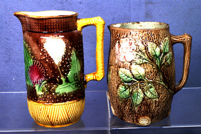 Appraisal: majolica pitchers floral and leaf patterns in height smaller one