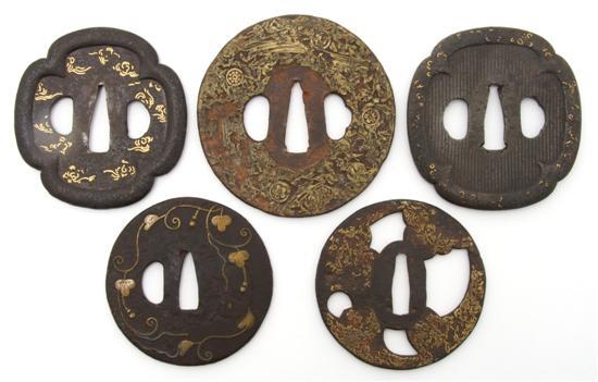 Appraisal: A Group of Five Iron Tsuba containing examples by Yoshiro