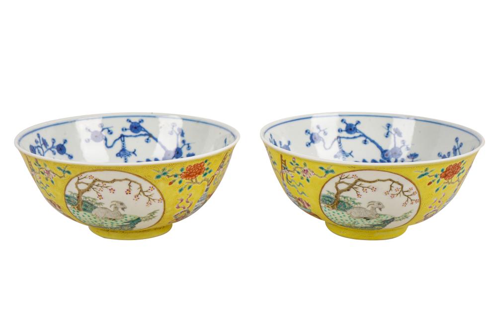 Appraisal: PAIR OF CHINESE YELLOW GROUND PORCELAIN BOWLSwith six-character mark to