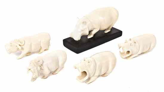 Appraisal: Three African Carved Ivory Hippopotami the largest on a rectangular