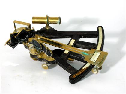 Appraisal: Ebony and brass sextant th century With wood case L