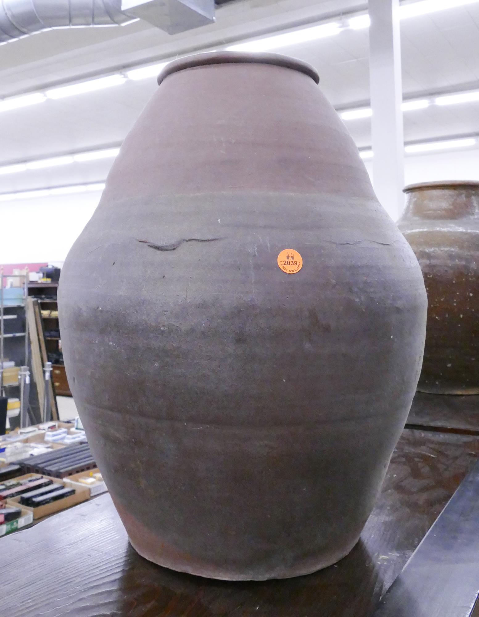 Appraisal: Large Meiji Japanese Provincial Tone Brown Pottery Jar- ''