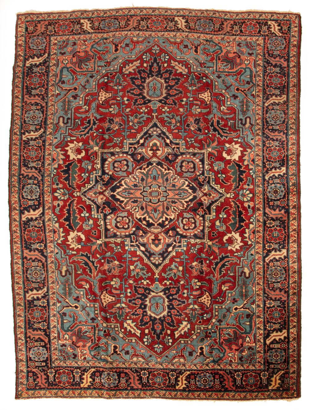 Appraisal: Semi-Antique Heriz Carpet red and blue ground stylized floral design