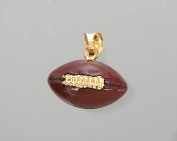 Appraisal: An Italian k and Enamel Football Pendant k yellow gold