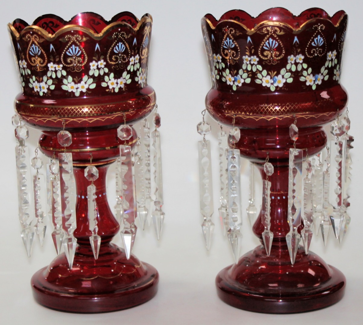 Appraisal: A pair of Victorian ruby glass lustres each with castellated