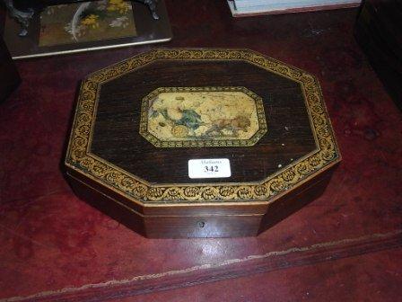 Appraisal: A REGENCY MAHOGANY AND SIMULATED ROSEWOOD OCTAGONAL WORKBOX with panel